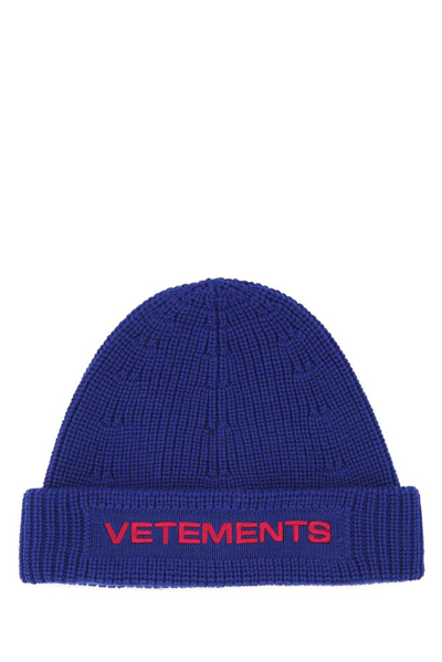 Shop Vetements Logo Embroidered Knitted Beanie In Blue
