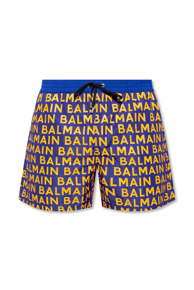 Shop Balmain Allover Logo Printed Drawstring Swim Shorts In Multi