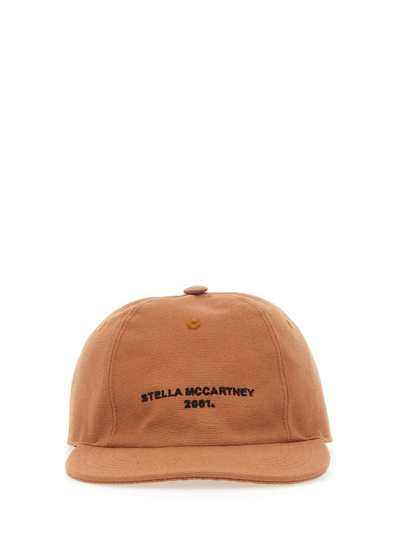 Shop Stella Mccartney Logo Embroidered Baseball Cap In Brown