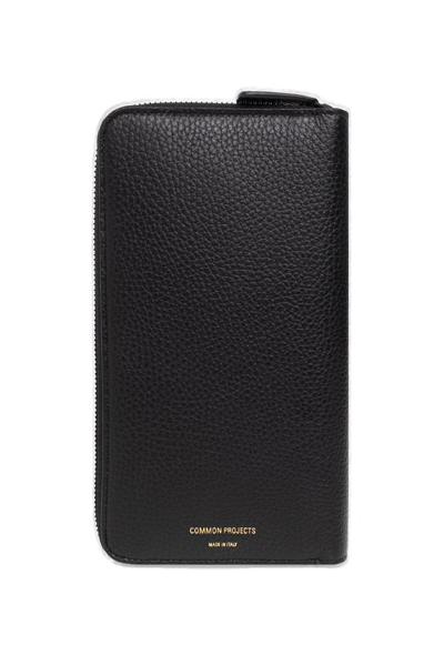 Shop Common Projects Logo Embossed Continental Wallet In Black