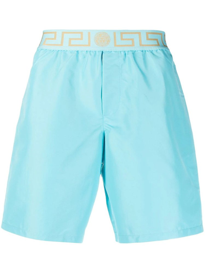 Shop Versace Greca Waistband Swim Shorts In Blue