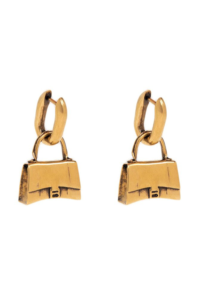 Shop Balenciaga Hourglass Bag Charm Earrings In Gold