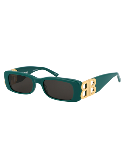 Shop Balenciaga Bb0096s Sunglasses In 006 Green Gold Grey