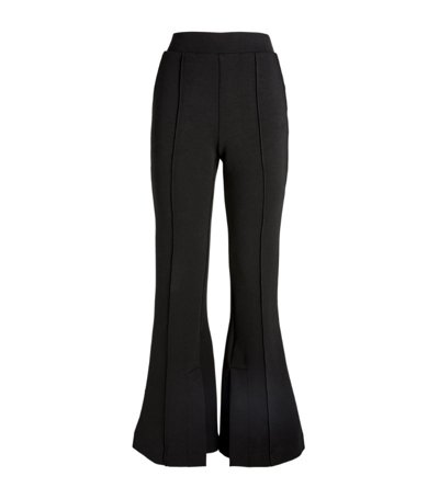 Shop Frame Scuba-knit Flared Trousers In Black
