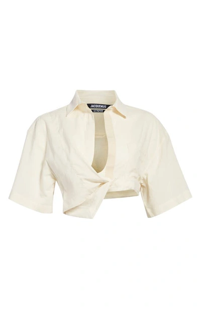 Shop Jacquemus La Chemise Capri Twist Cotton Shirt In Off-white