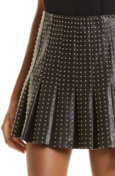 Shop Alice And Olivia Carter Stud Detail Faux Leather Pleated Miniskirt In Black