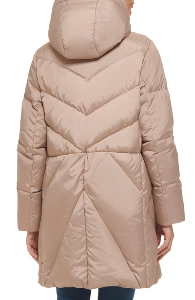 Shop Cole Haan Signature Cocoon Hooded Down & Feather Fill Puffer Jacket With Faux Fur Trim In Sand
