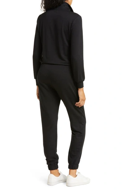 Shop Beyond Yoga Ski Weekend Half Zip Jumpsuit In Black