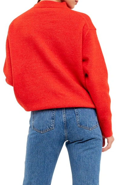 Endless Rose Relaxed Fit Mock Neck Sweater In Orange