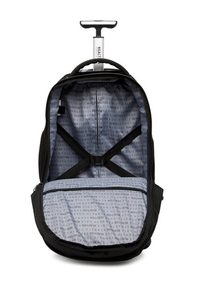 Reaction Kenneth Cole 1680d Poly 4 Wheel Roller Backpack In Black