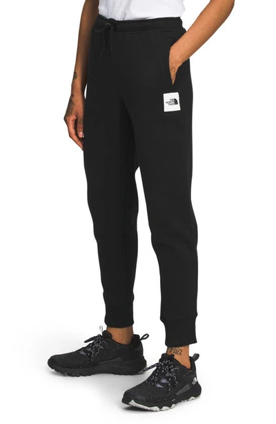 Shop The North Face Cotton Blend Joggers In Tnf Black/ Tnf White