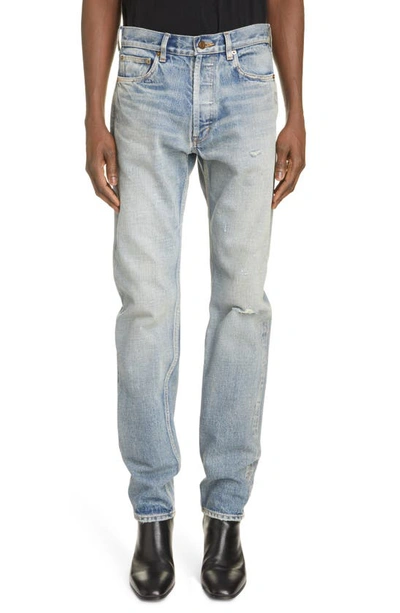 Shop Saint Laurent Distressed Relaxed Fit Jeans In Melrose Blue