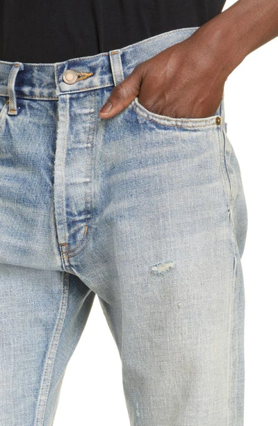 Shop Saint Laurent Distressed Relaxed Fit Jeans In Melrose Blue