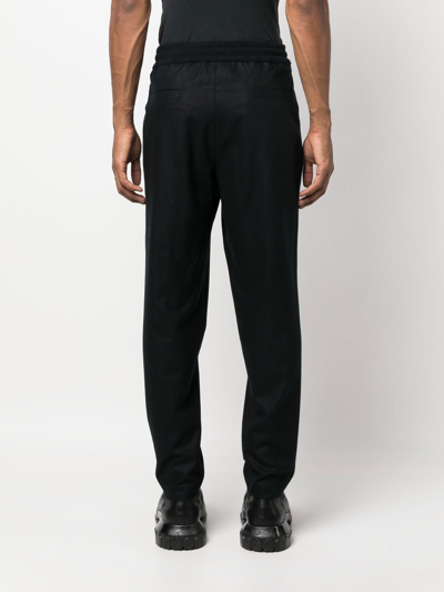 Shop Moncler Elaticated-waist Wool Tousers In Black