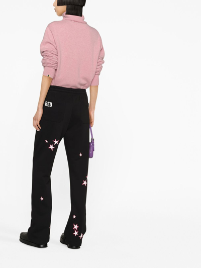 Shop Red Valentino Star-print Trousers In Black