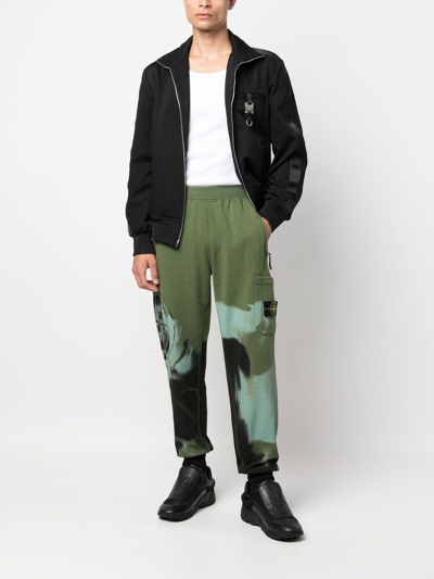 Shop Stone Island Motion Saturation Abstract-print Track Pants In Green