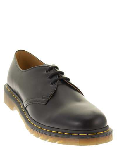 Shop Dr. Martens' 1461 Smooth - Laced In Black Smooth