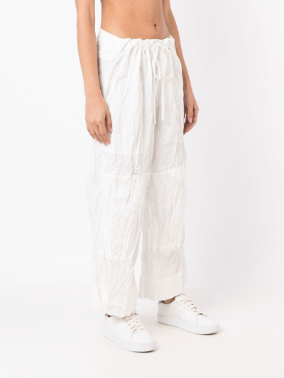 Osklen Crinkled-finish Detail Trousers In White
