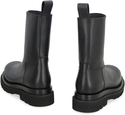 Shop Bottega Veneta Lug Leather Ankle Boots In Black