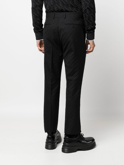 Shop Fendi O'lock Wool Trousers In Black