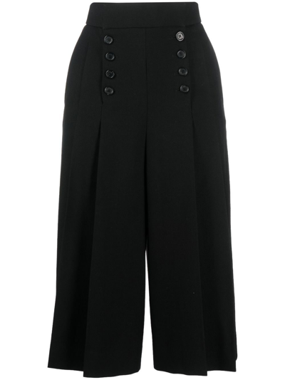 Shop Saint Laurent Pleated Cropped Wool Trousers In Black