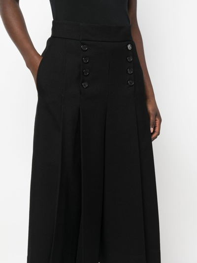 Shop Saint Laurent Pleated Cropped Wool Trousers In Black