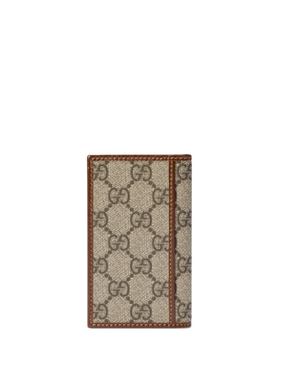 Gucci Gg Supreme-canvas Bi-fold Wallet In Brown