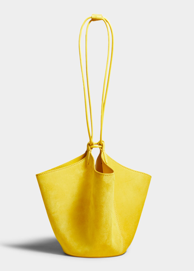 Shop Khaite Lotus Mini Drawstring Suede Bucket Bag In 612 Lemon