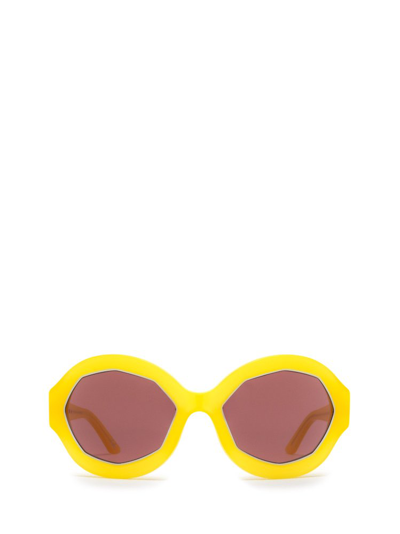 Shop Marni Eyewear Round Frame Sunglasses In Yellow