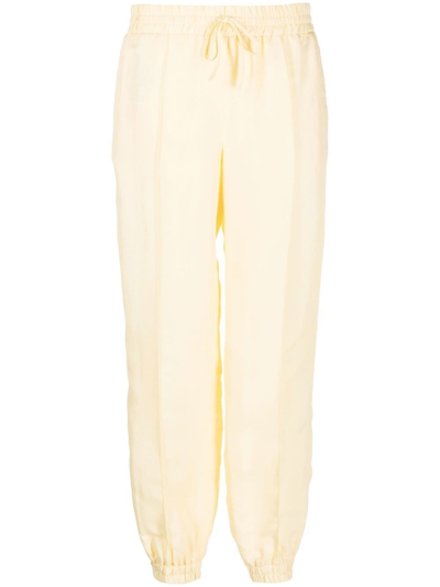 Shop Jil Sander Drawstring Cotton Track Pants In Yellow