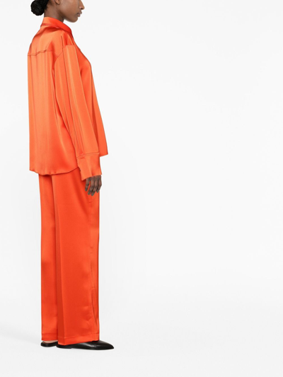 Shop Nanushka Wide-leg Satin Trousers In Orange