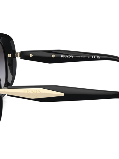 Shop Prada Logo-arm Detail Sunglasses In Schwarz