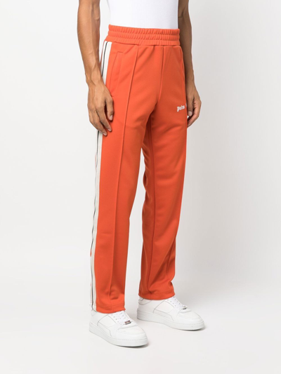 Shop Palm Angels Track Pants In Red