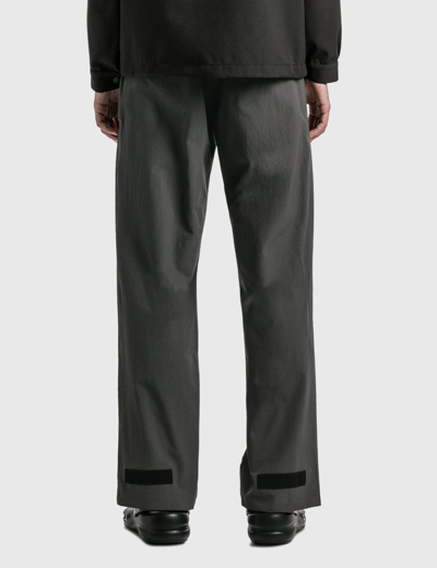 Shop Gr10k Schoeller®  Tailored Pants In Grey