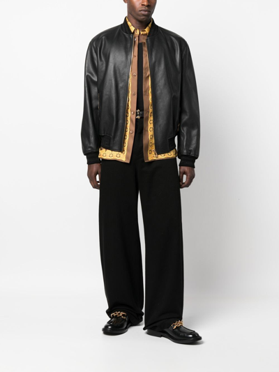 Shop Versace Greca Leather Bomber Jacket In Black