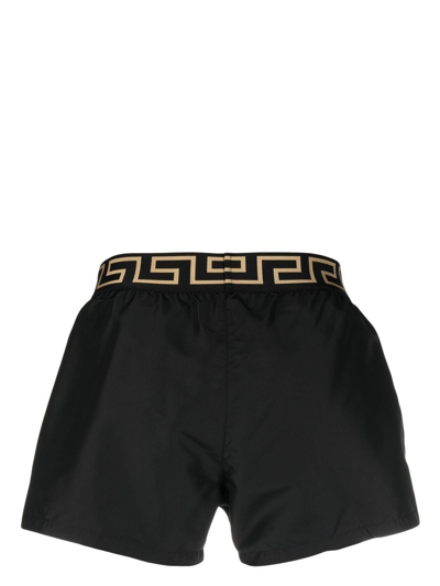 Shop Versace Greca Swim Shorts In Black