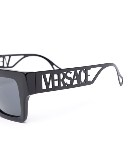 Shop Versace Logo-arm Square-frame Sunglasses In Black