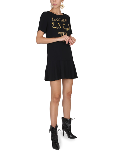 Shop Moschino Handle With Care Dress In Nero