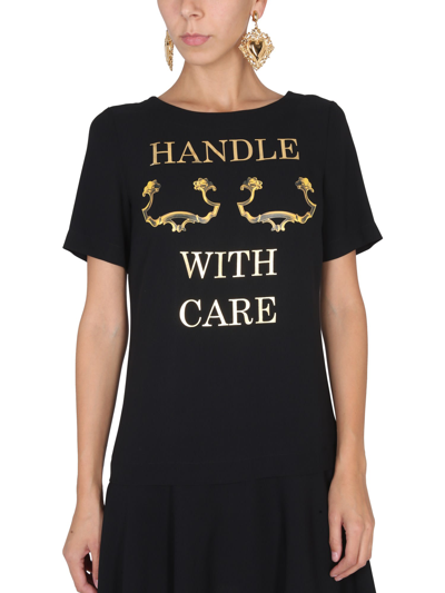 Shop Moschino Handle With Care Dress In Nero
