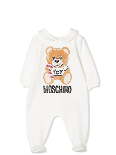 Shop Moschino Jumpsuit With Print In White