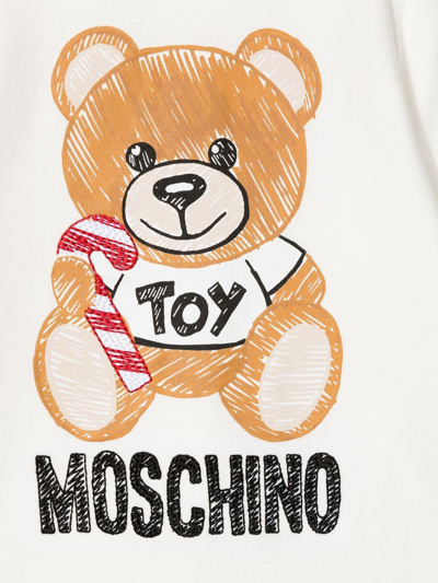 Shop Moschino Jumpsuit With Print In White