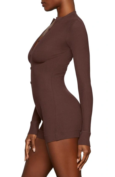 Shop Skims Soft Lounge Long Sleeve Henley Romper Pajamas In Cocoa