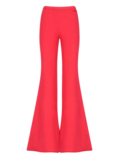 Shop Vetements Maxi Flared Trousers In Rosso