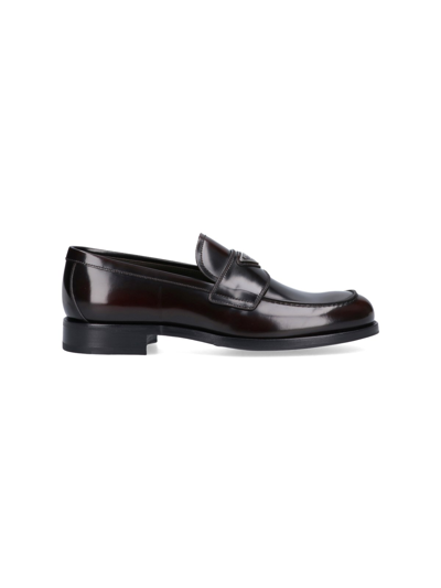 Prada Triangle Logo Brushed Leather Loafers In Marrone