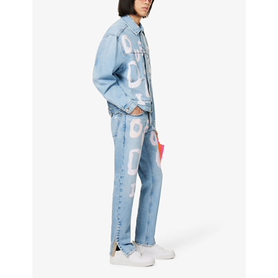 Shop Due Diligence Graphic-print Mid-rise Tapered-leg Jeans In Blue