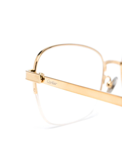 Shop Cartier Square-frame Engraved-logo Glasses In Gold