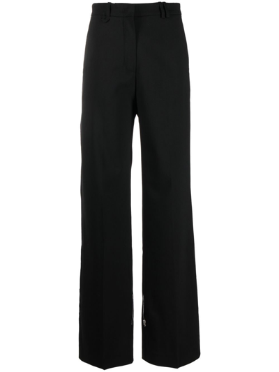 Shop Jacquemus Tapered Trousers In Black