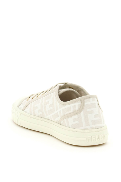 Shop Fendi Domino Sneakers In White