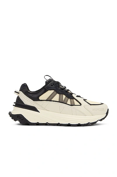 Shop Moncler Lite Runner Low Top Sneakers In White & Black