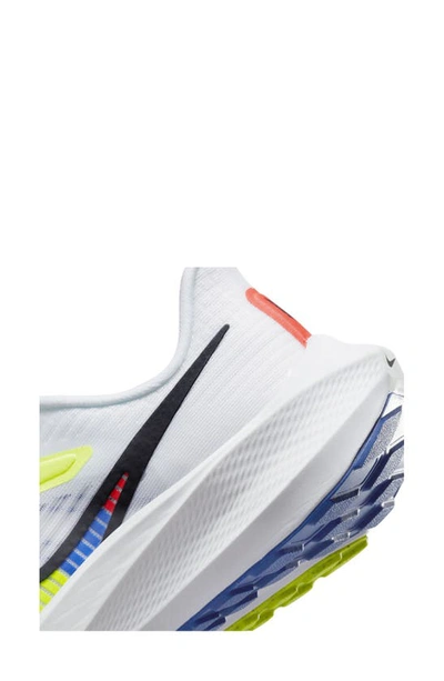 Shop Nike Kids' Air Zoom Pegasus 39 Sneaker In White/ Volt/ Racer Blue/ Black
